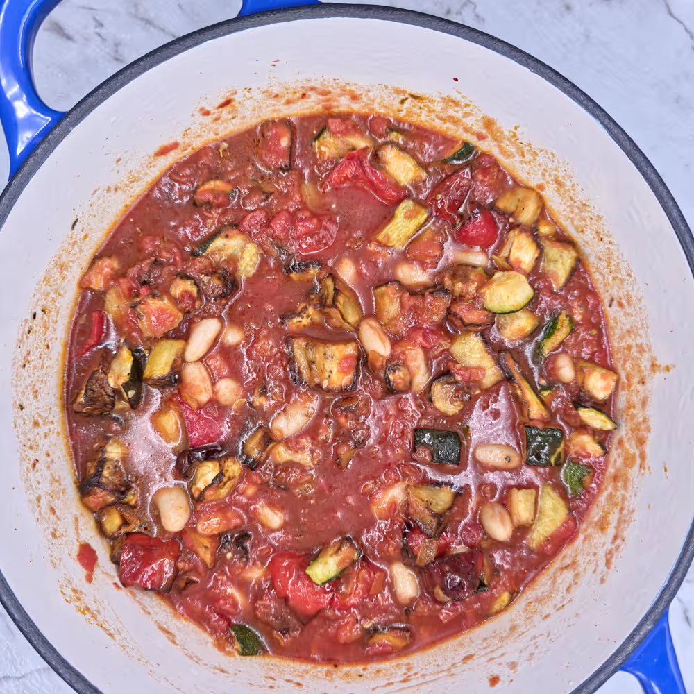Cooking Pot. Mixed Tomoto Sauce, Post Onion Garlic